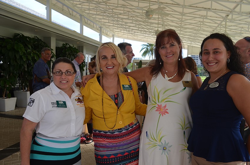 Debbie Shaffer, of Wentzel’s, Penelope Mabrey, of Servpro, Tammy Halsted, of RVA, and Aurora Kane, of Century 21