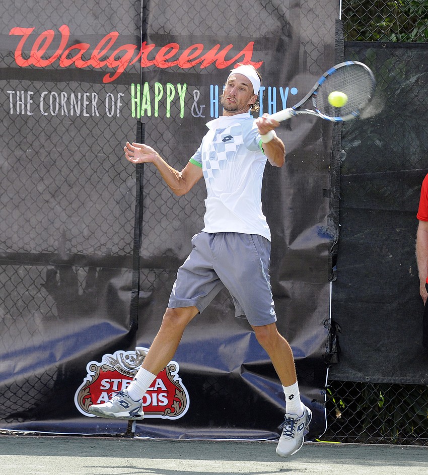 Ruben Bemelmans returns a serve during the Sarasota Open’s men’s singles tournament.