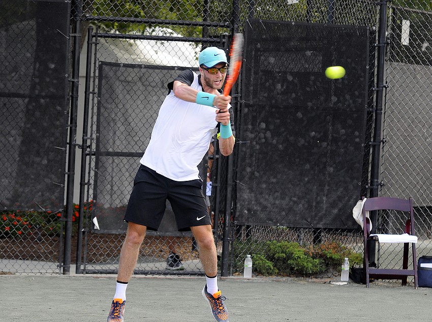 Liam Broady of Great Britain returns a serve during the main draw of the men’s singles tournament.