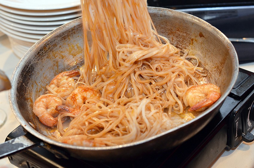 Guests prepared the ‘Taste of Asia’ menu at Cooking for Wishes Thursday, Feb. 26, at Michael’s On East.