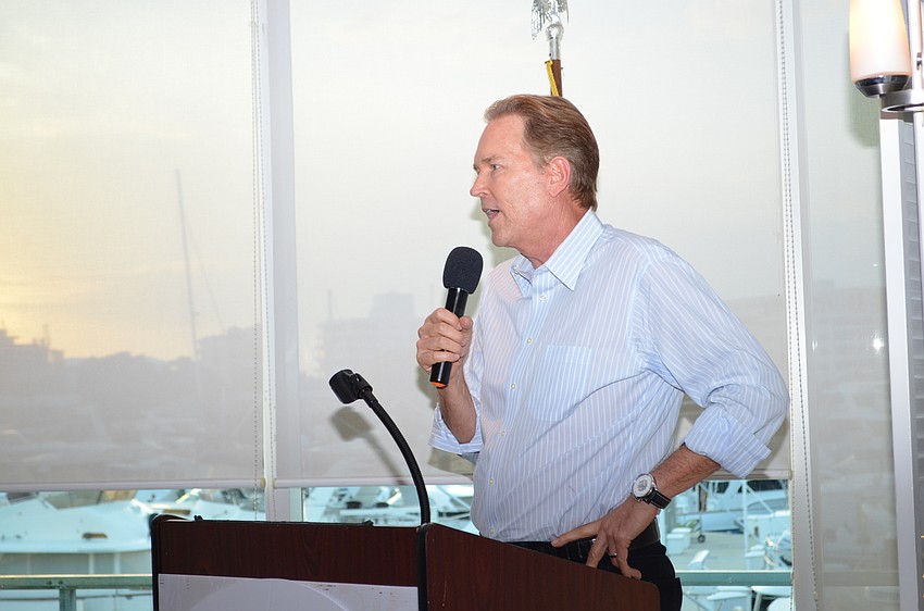 Rep. Vern Buchanan addresses guests during the Sarasota Republican Club dinner meeting.