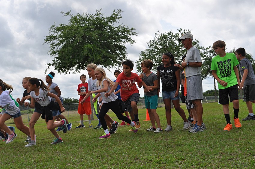 The first group of fifth-grade students take off.