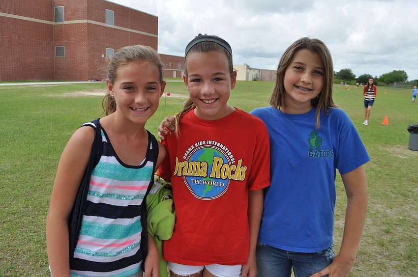 Madisyn Kidgell, Mia Lyle and Zoe Lipton enjoy the walk together.