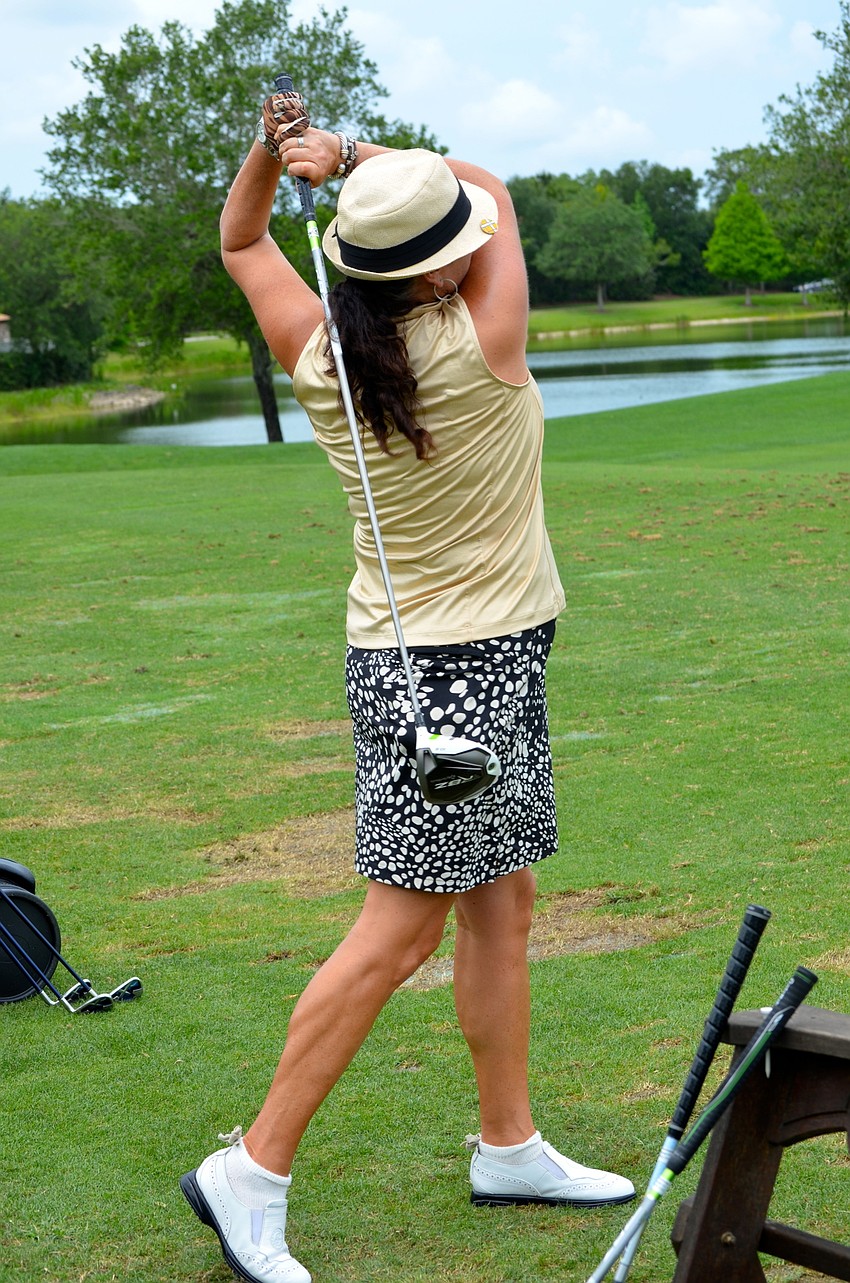 Kimberlie Buchanan is an avid golfer who goes out on the green as often as she can.