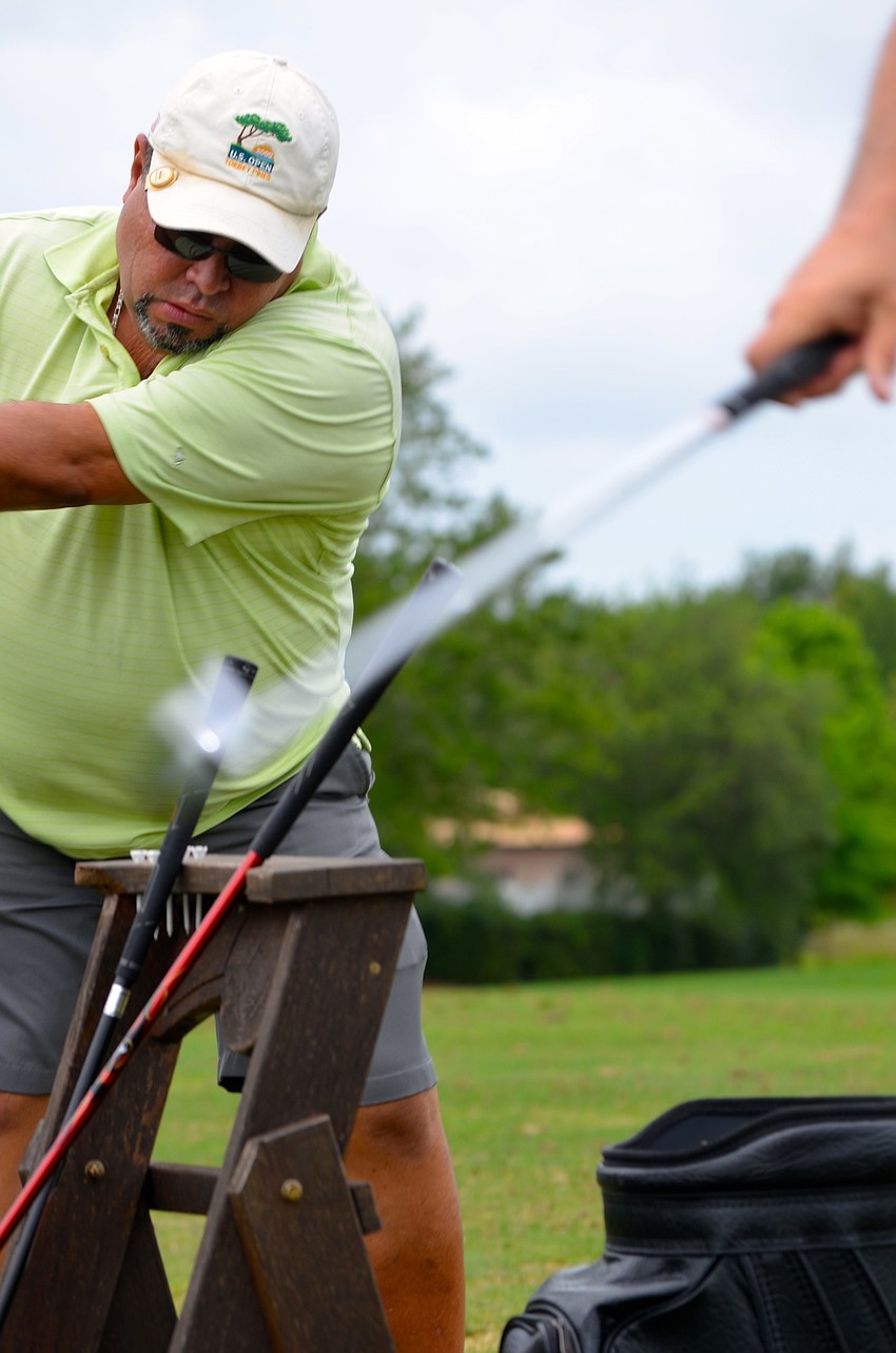 Bill Vargas hits his ball of the tee with full force.