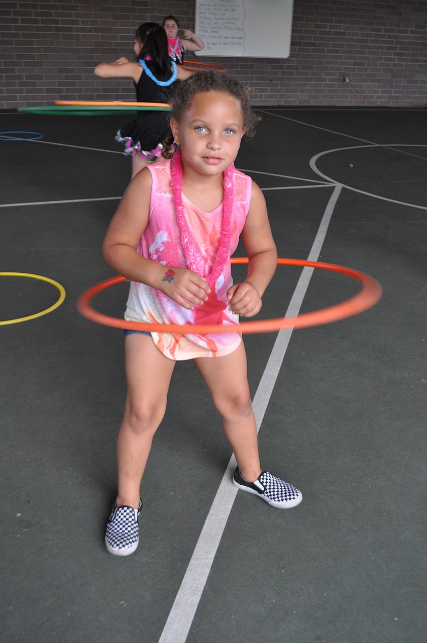 Celena Waller, 6, can keep her hula hoop going for minutes.