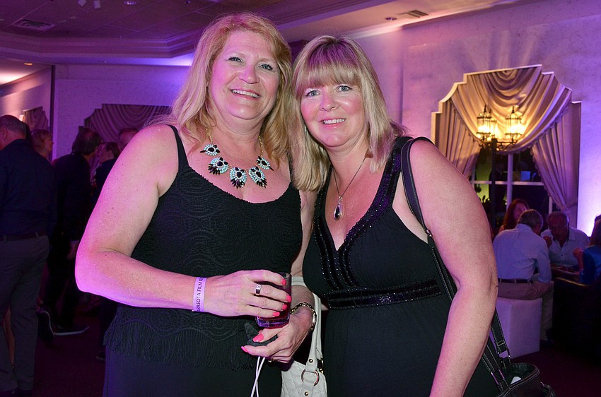 Laura Saunders and Gina Mills