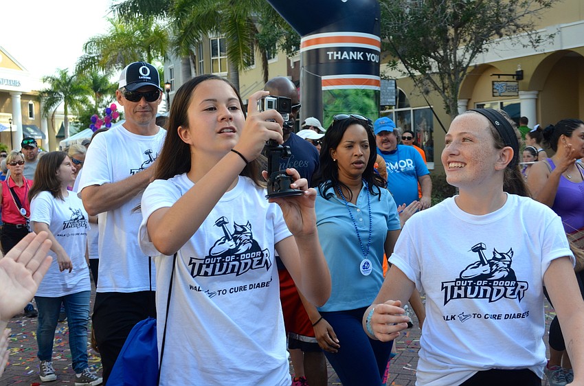 Kat Gaukhman commemorates the event by shooting video.