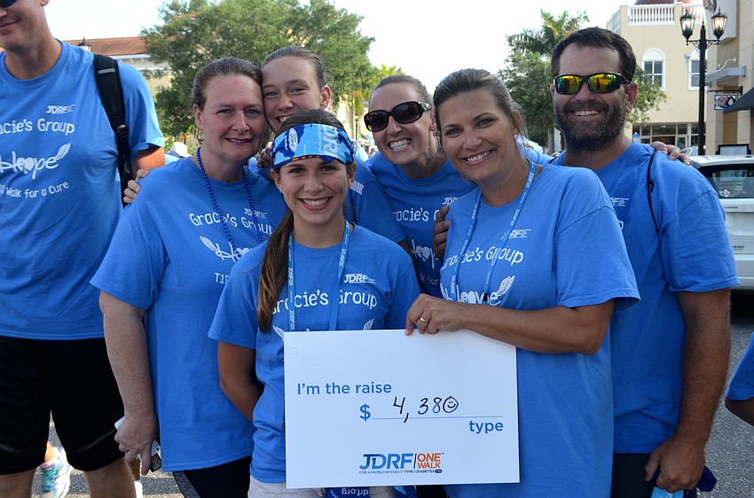 — Trisha and Kate Fuchs, Lauren Weinkein, and Todd and Allyson Lewis walk for Gracie Lewis.