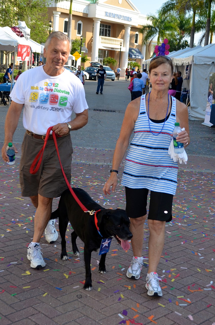 Dale, Luke and Mary Ann Vollrath keep up with the crowd of walkers.