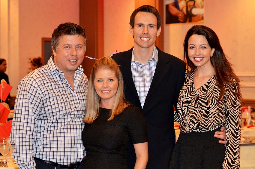 Jesse and Katie Biter with Matt and Diana Buchanan