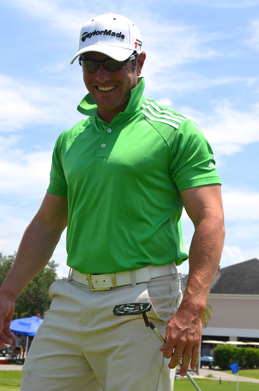 Nick Arthur, of Crossfit Lena, enjoys practicing with his friends and co-workers before the event.