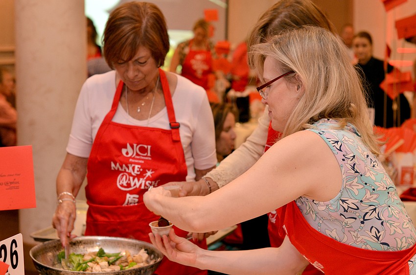Guests prepare their own food at Cooking for Wishes.