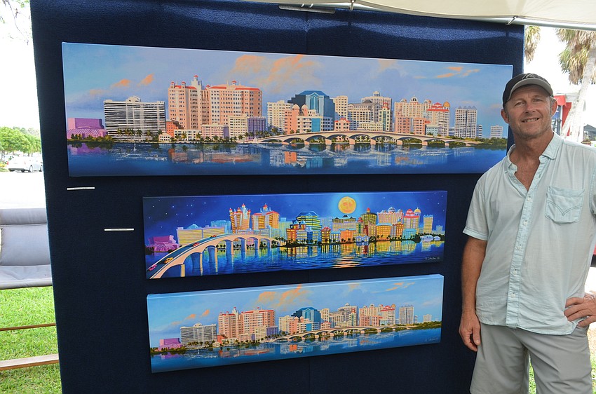 Oil painter Robert Johnson with his paintings of Sarasota