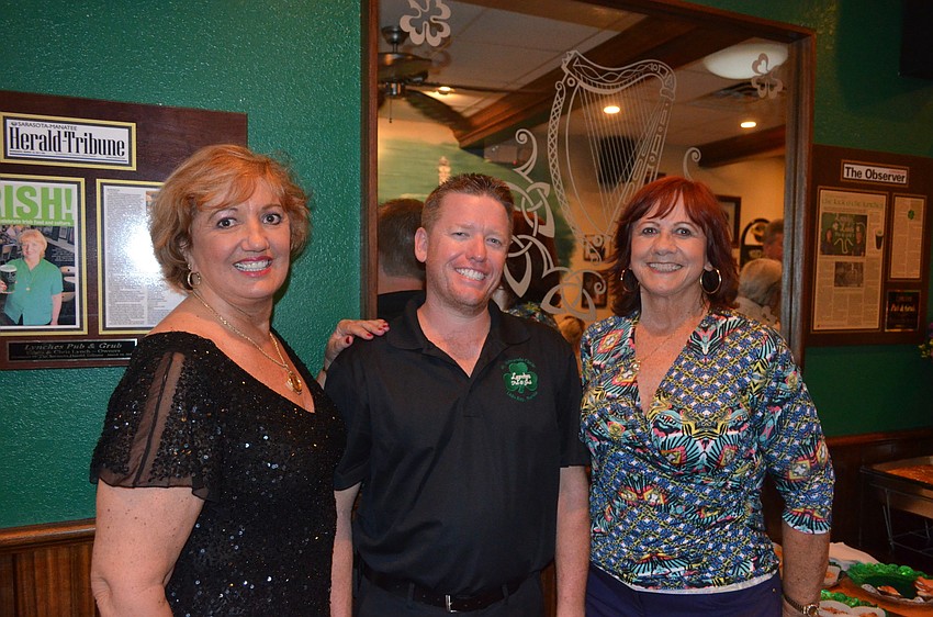 Chris Lynch, new owner Jason Burns and Ethna Lynch
