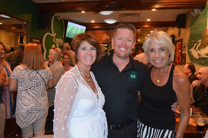 Cathy Kaplinski, new owner Jason Burns and Jane Hunter