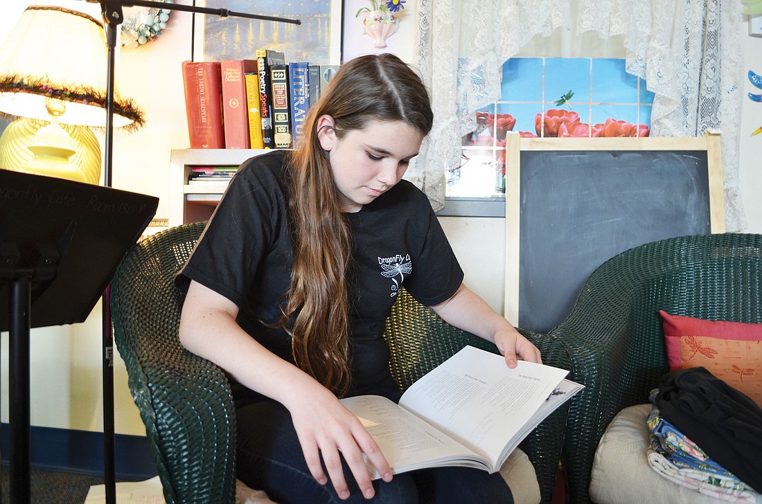 Payton Saturen, an eighth-grader at Booker Middle School, is a finalist in Poetry Life's "Young Voice Poetry Reading" contest this year and will read her original work in front of a live audience. Photo by Nick Reichert.