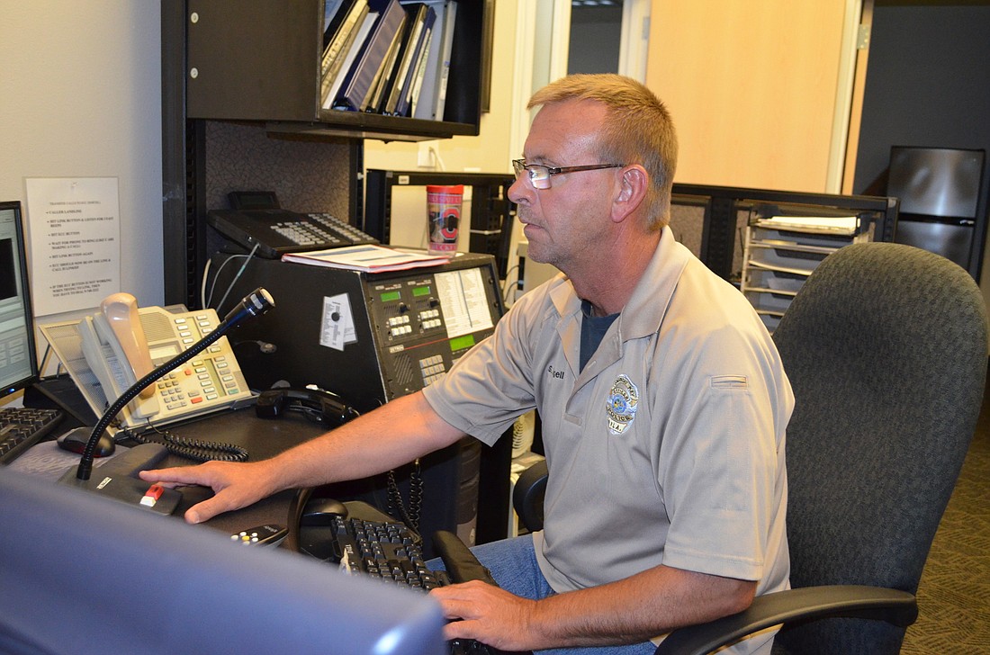 Longboat Key Marine Police Officer Shawn Nagell, a 15-year veteran of the police department, has been trained as a 911 dispatcher and is receiving overtime for taking on the extra responsibilities.