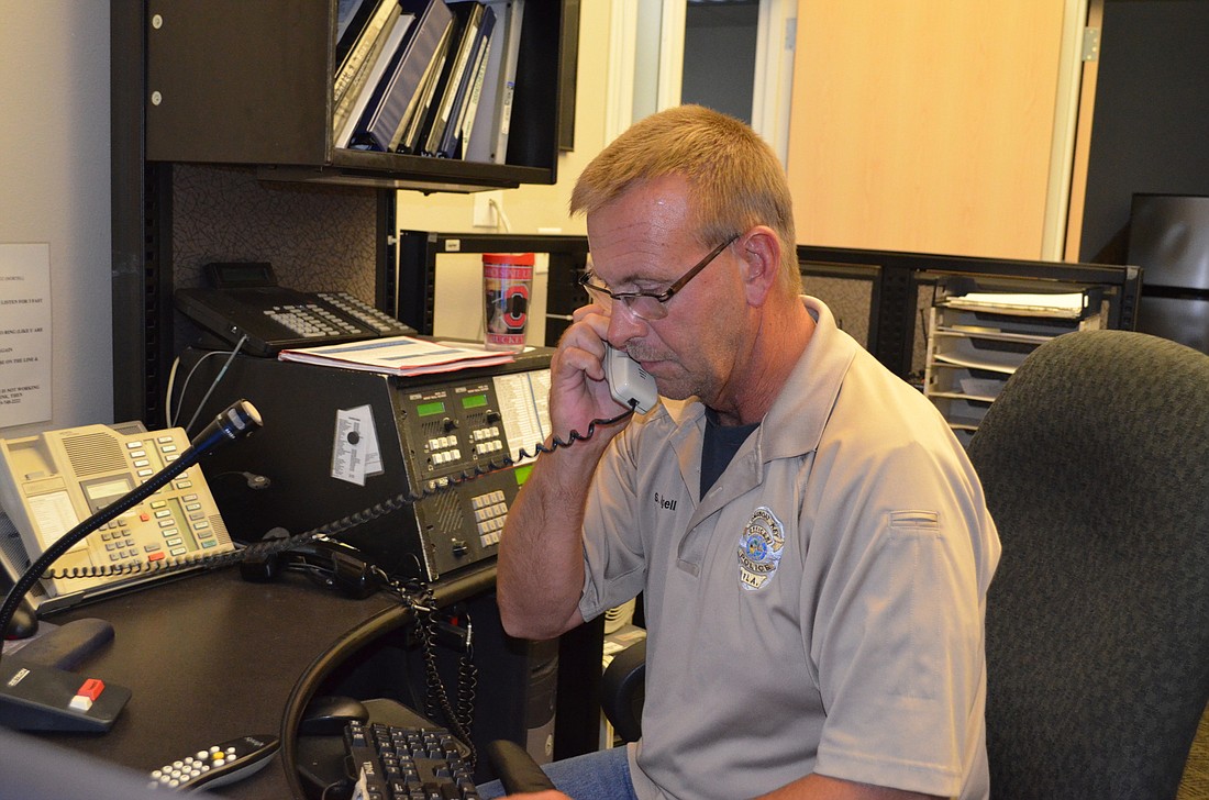 Longboat Key Marine Police Officer Shawn Nagell, a 15-year veteran of the police department, has been trained as a 911 dispatcher and is receiving overtime for taking on dispatch responsibilities.