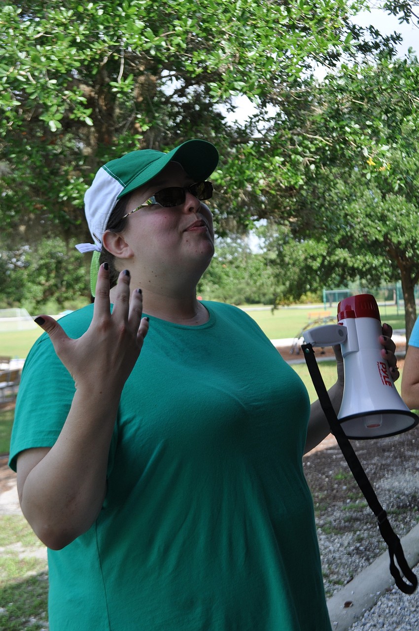 eacher Robin Hettler inspires children to compete hard for a 4-foot-tall trophy.