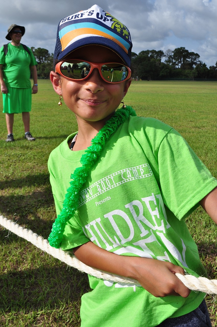 Gianna Goodwin, 9, puts up an intense fight in the tug of war.