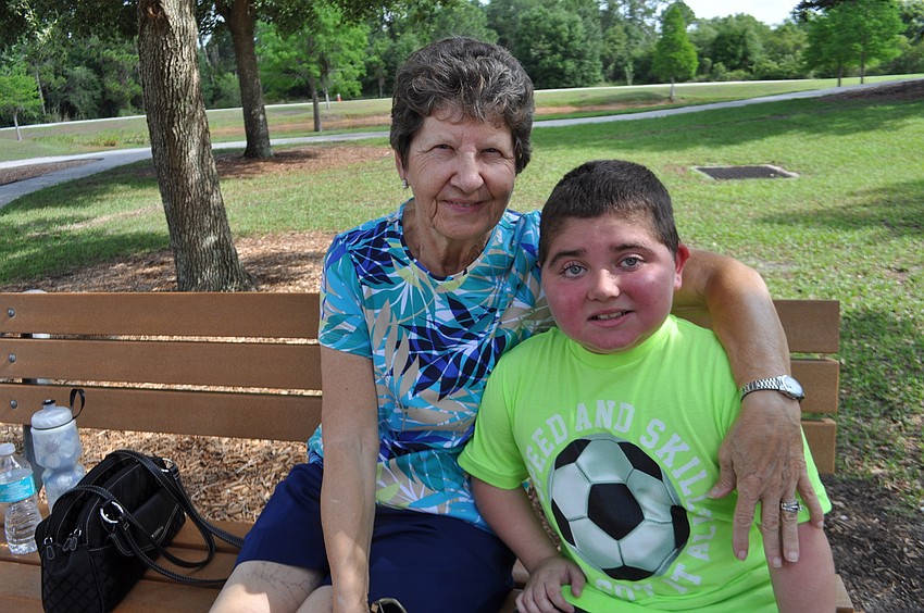 Heritage Harbour resident Lucy Tullio attends with her grandson, student Grayson Tullio, of Lakewood Ranch.