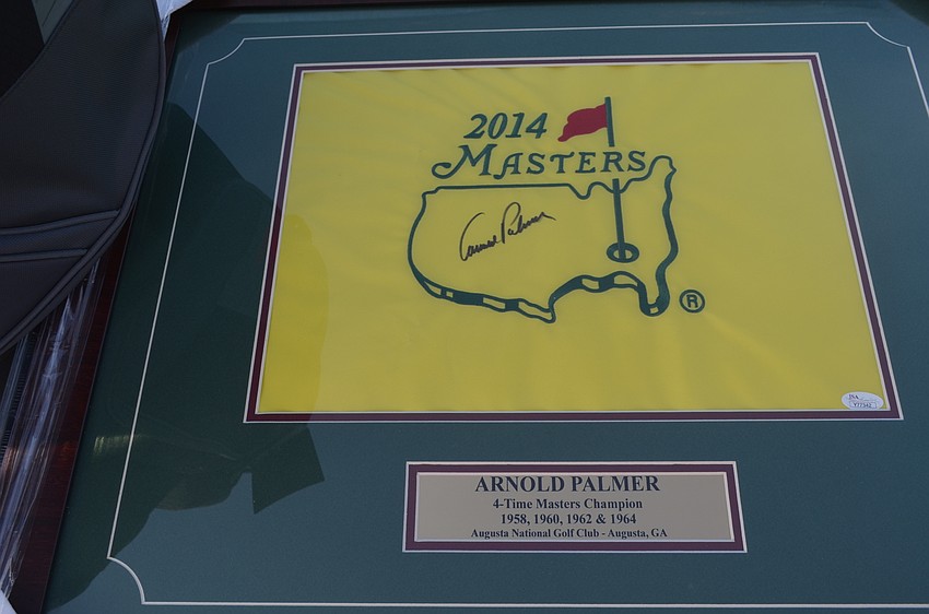 The silent auction included signed memorabilia from famous golfers such as Arnold Palmer.