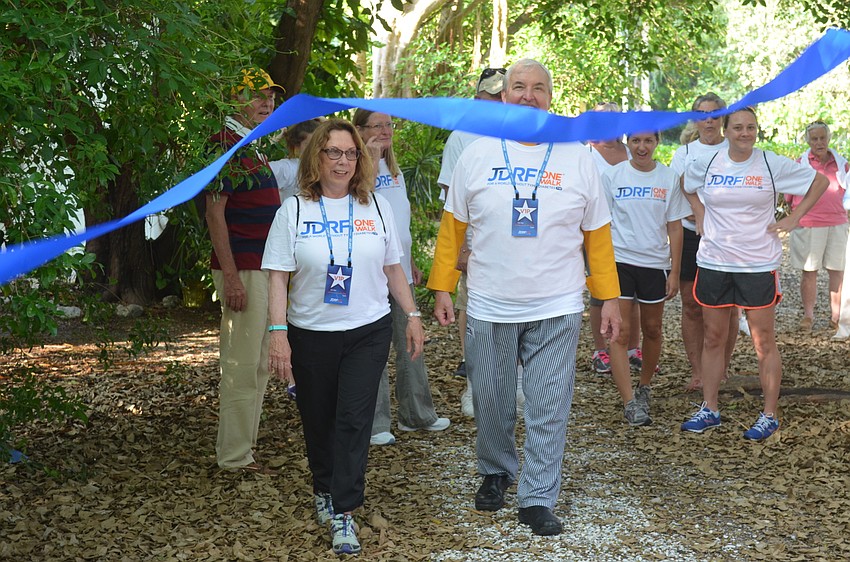 D’Arcy and Fred Arpke prepare to cross the starting line.