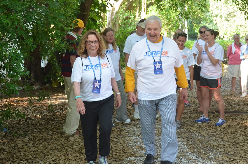 D’Arcy and Fred Arpke cross the starting line.