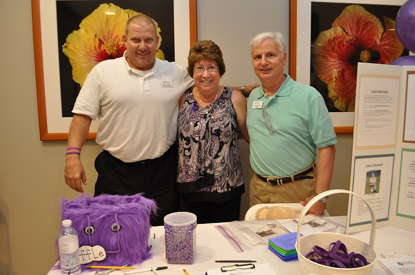 JoshProvides Epilepsy Assistance Foundation’s Vice President of Development Duncan Tanner Jr. works a booth with volunteer and Lakewood Ranch resident Rossana Schmidt and organization co-founder and Executive Director Bruce Chapnick.