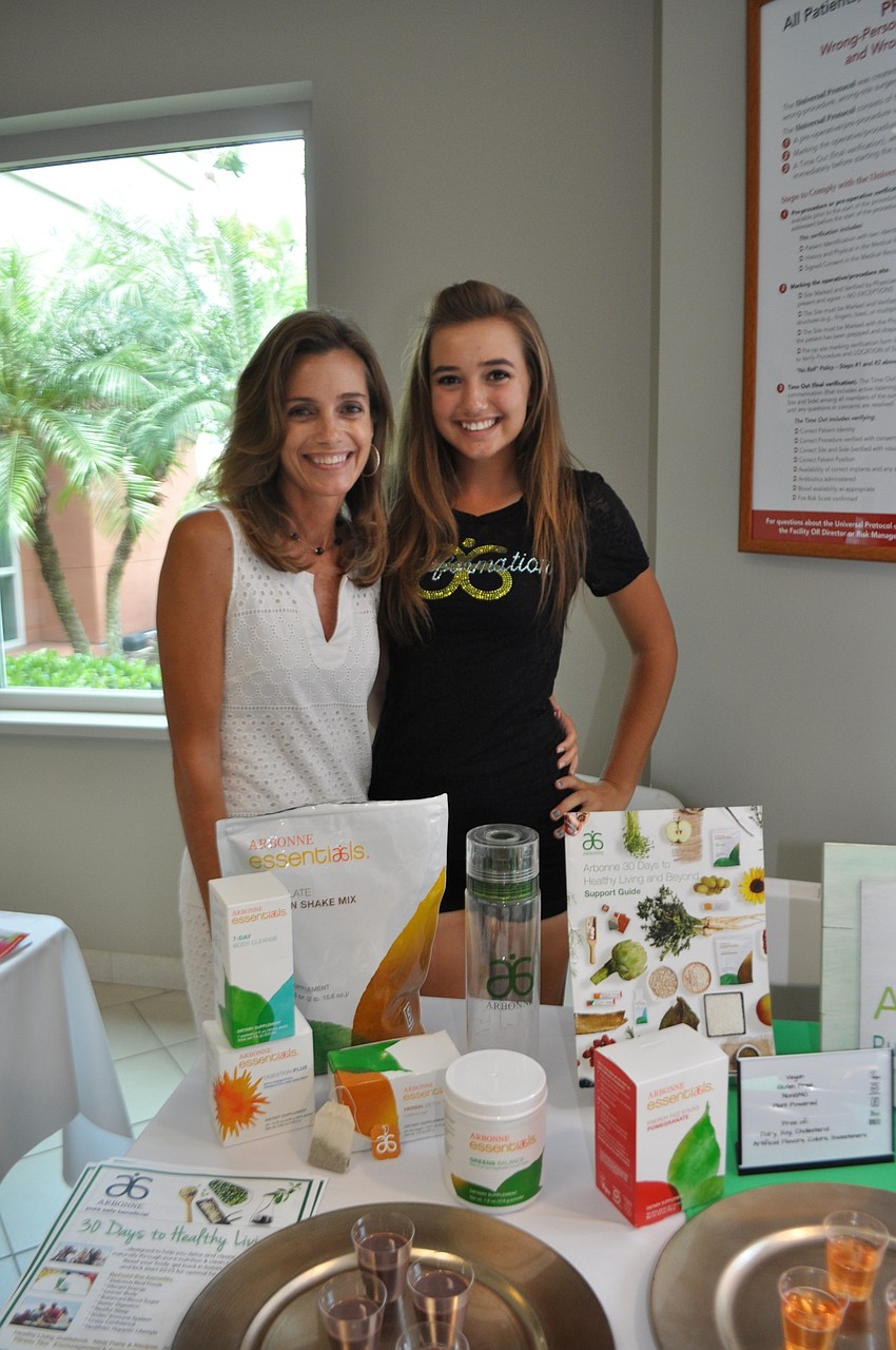 Debra Warren and her daughter, Sophia, represent Arbonne.