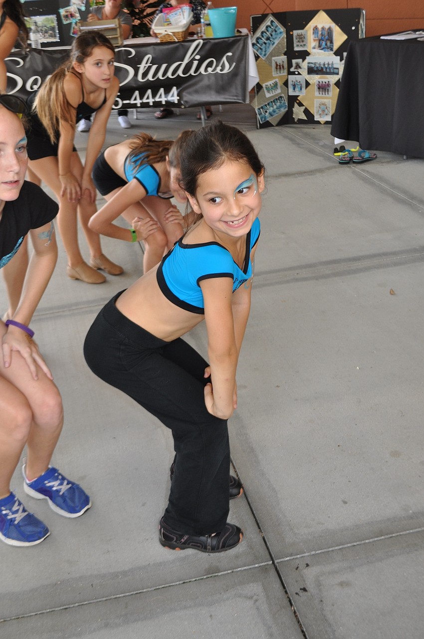 Sheriza Hernandez, front, performs with Soul Studios dancers.