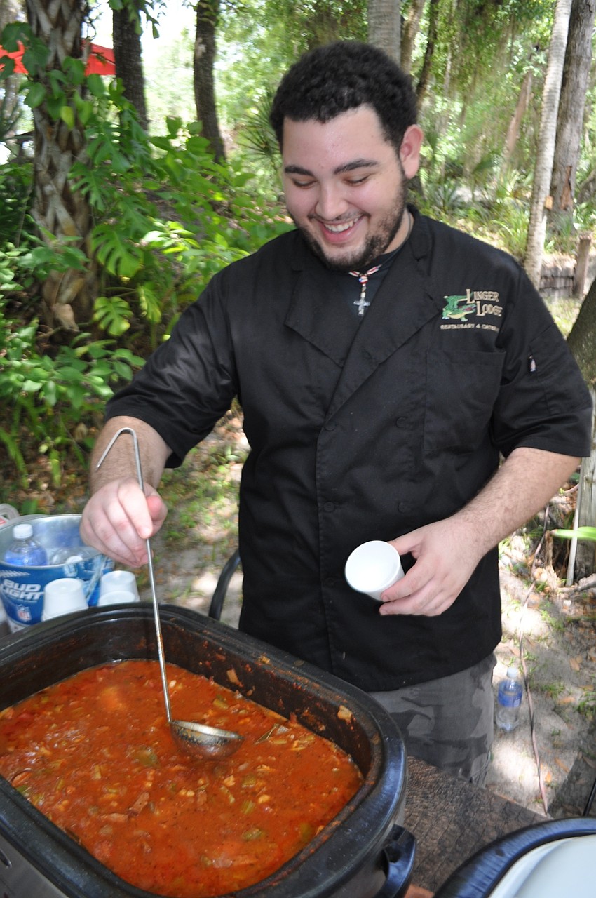 Ernestor Enchautegui Jr. serves Linger Lodge’s famous gumbo.