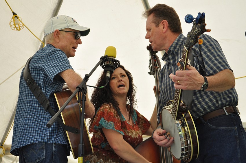 Sonya Stratton and the Straight South performs. Pictured are musicians Doug Row on lead guitar, Sonya Stratton and Jeff Folger, on the banjo.