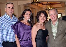 Paul and Carla Barbosa with Tommie and Carl Cannova
