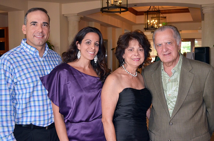 Paul and Carla Barbosa with Tommie and Carl Cannova