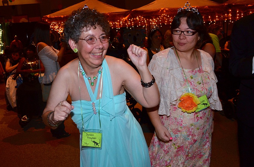 Susan Traynor loves to dance, especially with friends, such as Keri Milder.