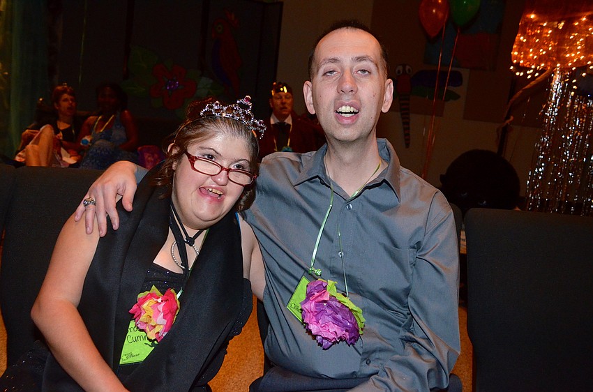 Brooksann Cummings and William Miller enjoy talking throughout the night.