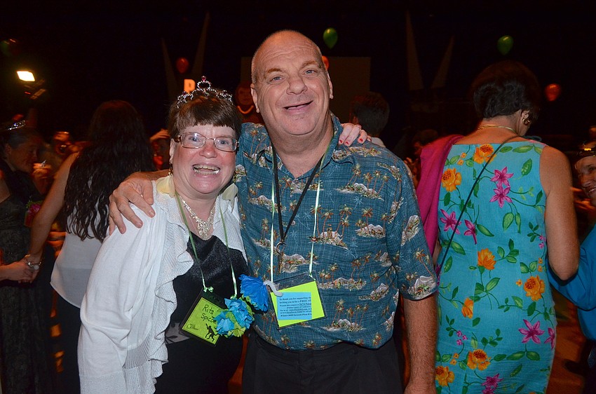 Rita Spicola and Paul Speiker take a break from dancing for a photo.