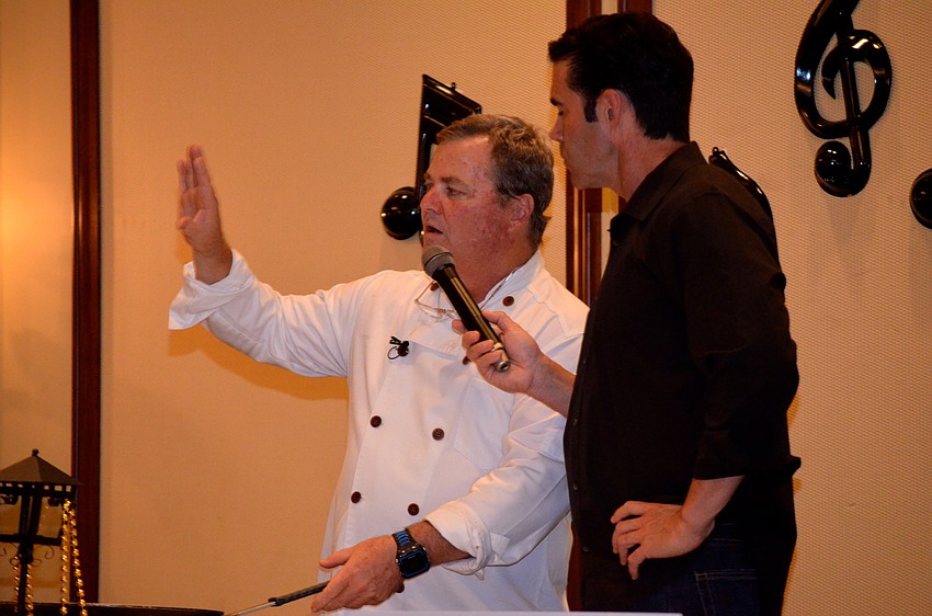 Polo Grill and Bar owner and chef Tommy Klauber and comedian Tim Wilkins lead a cooking demonstration.