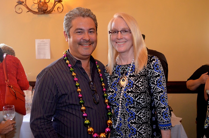 J.J. Miranda shows off his themed accessories beside his wife, Jodi.