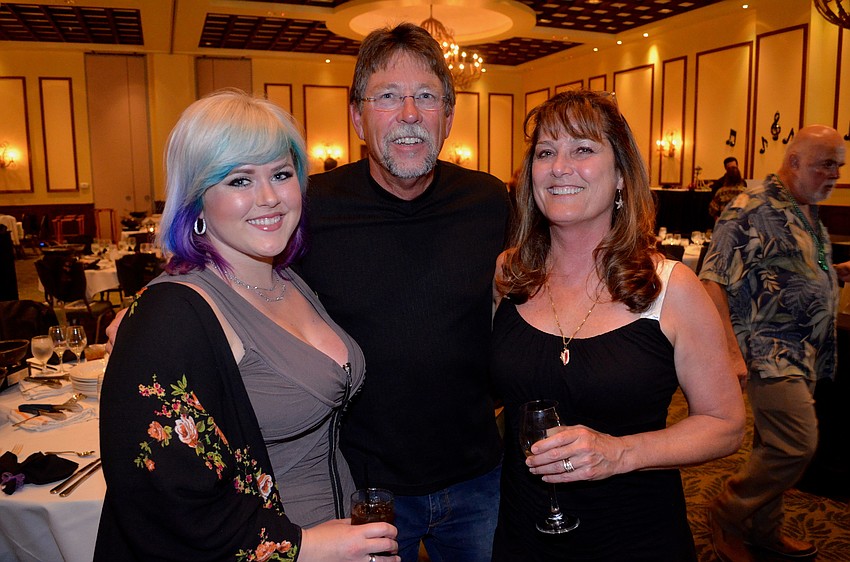 Jessica Petrat jokes with Tim and Ciindy Hayden before finding her seat.