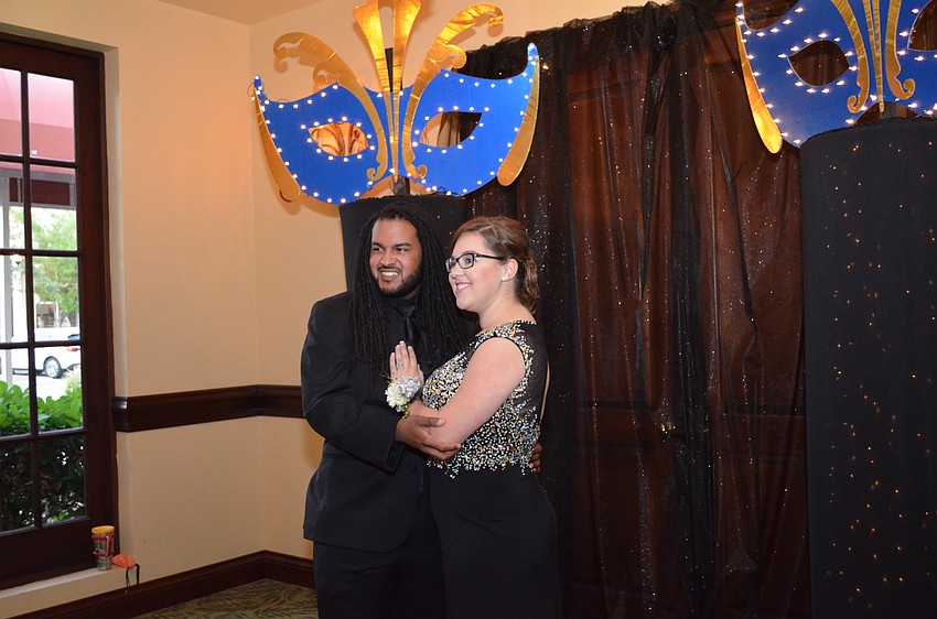 Charles Adams and Sarah Jackel pose for a photo.