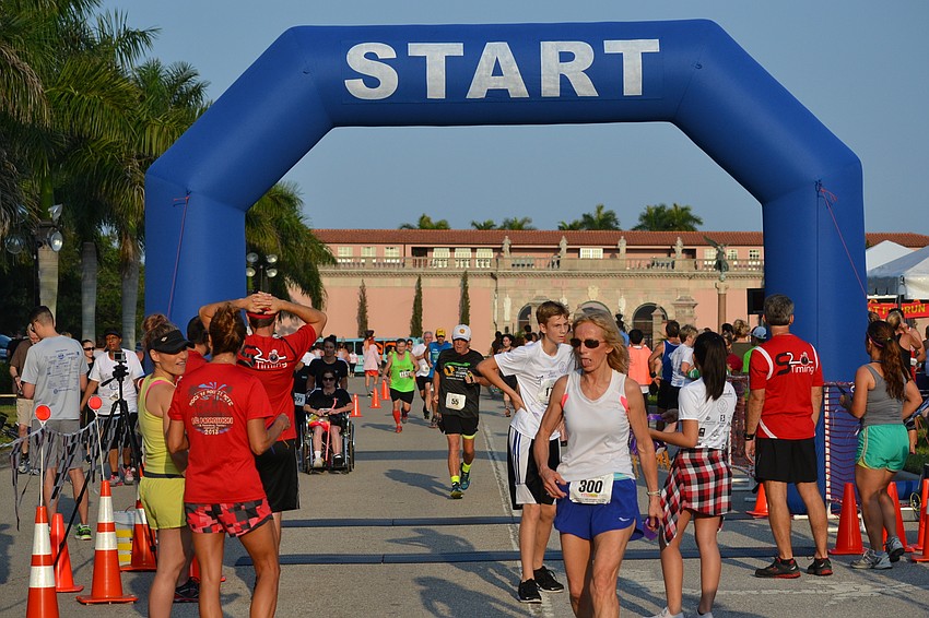 Runners approach the finish line at Ringling Plaza.