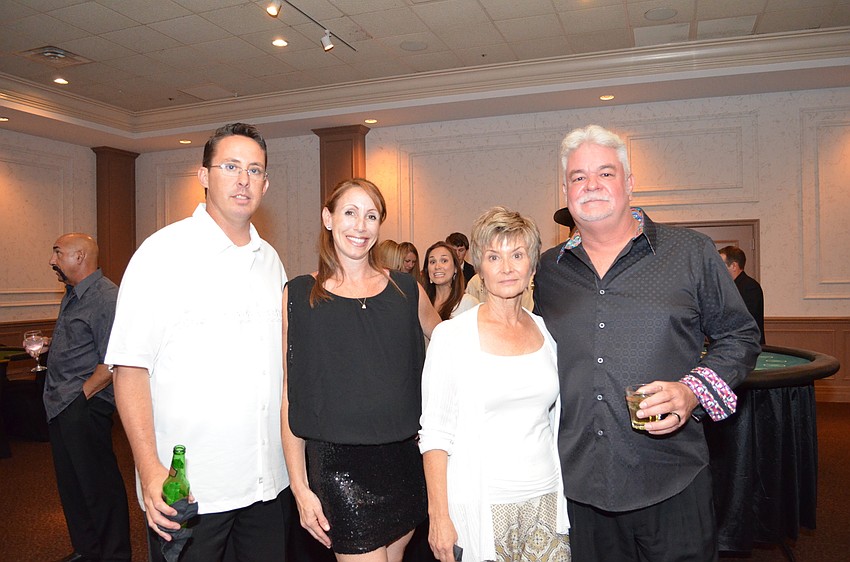 Southside Foundation President Derrick Maginness, Deb Lombard, Jodi Sobol and Southside Elementary Principal Steve Dragon