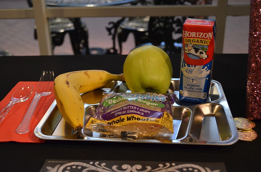 One of the items in the silent auction included a school-lunch date with principal Steve Dragon.