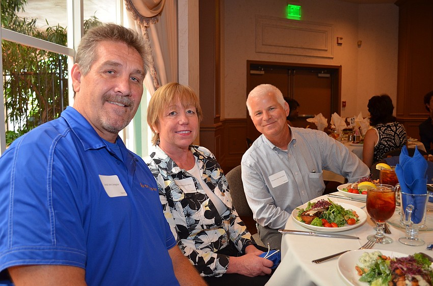 All Faiths Food Bank COO John Livingston, Nancy Erickson and Don Herndon