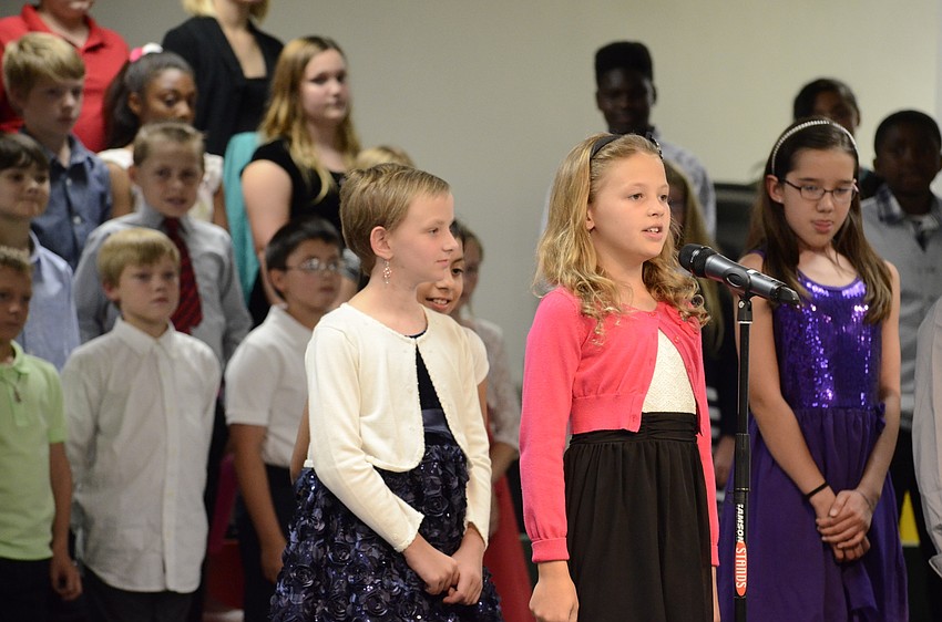 Mila Risner speaks to the audience.