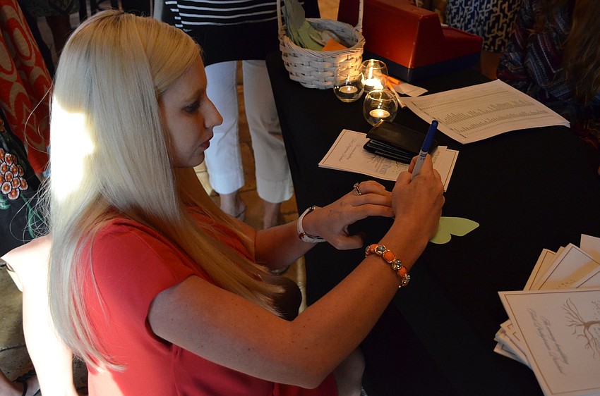 Jenny Infanti sings a butterfly with a message for her son Alex.