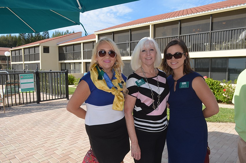 Penelope Mabrey, of Servpro of Bradenton, Debra Fortosis, of Elite Family Care, and Kinsey Patel, of Northwestern Mutual